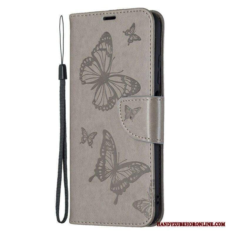 Custodia in pelle Xiaomi Redmi Note 10 5G Farfalle Stampate Strappy